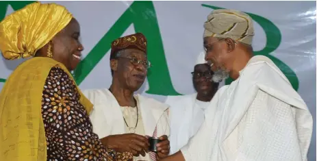  ?? ?? / R /ydia Shehu, Sermanent secretary, )ederal Ministry of Informatio­n and &ulture /ai Mohammed, minister of informatio­n and culture, and Rauf Aregbesola, minister of Interior, during the 4th Edition of PMB Scorecard Media Briefing in Abuja, yesterday. NAN