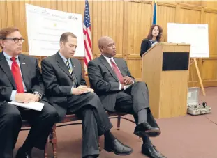  ?? COURANT FILE PHOTO ?? Former CEO of the Jumoke Academy charter school Michael M. Sharpe, third from left, is facing charges in connection with a series of sexual assaults committed in 1984.