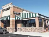  ?? STU BOYD II/THE COMMERCIAL APPEAL ?? The 10th location of the Huey’s restaurant chain opened in Olive Branch.