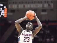  ?? Jessica Hill / Associated Press ?? UConn’s Akok Akok could see his first game action on Saturday since tearing his Achilles tendon last February.
