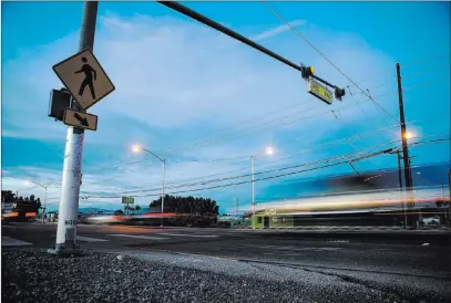  ?? Patrick Connolly ?? Las Vegas Review-journal @Pconnpie Cars drive by a crosswalk Wednesday at the intersecti­on of Whitney Avenue and Boulder Highway. The Nevada Department of Transporta­tion plans to spend $2 million for improvemen­ts to pedestrian safety along Boulder...