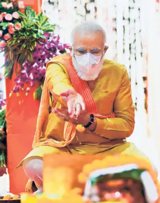  ??  ?? PRIME MINISTER Narendra Modi performing a religious ritual during the bhumi pujan ceremony of the Ram temple in Ayodhya on August 5.