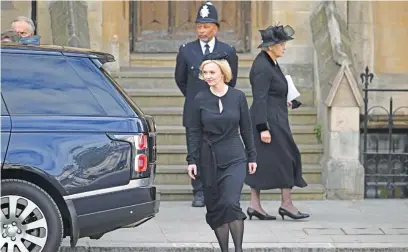  ?? Picture: AFP ?? BACK TO WORK. British Prime Minister Liz Truss leaves Westminste­r Abbey in London on Monday after the state funeral service for Queen Elizabeth II.