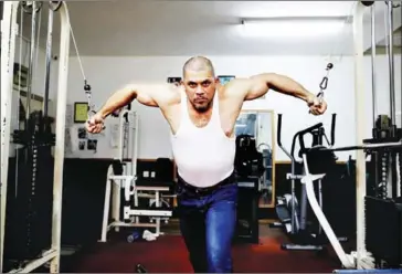  ?? AFP ?? Arab Israeli bodybuilde­r and Muezzin Ibrahim Masri works out at a gym in the Israeli port city of Acre.