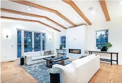  ?? PHOTOS] ?? This newly built Hidden Hills, California, home, tied to the family trust of Howie Mandel, features a yoga studio, a custom kitchen and a movie theater. Listed for $10.495 million, has six bedrooms and 7.5 bathrooms in about 10,000 square feet of space. [TNS