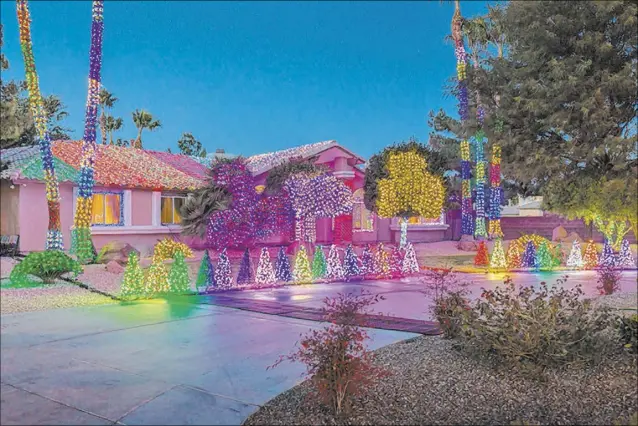  ?? DAVID REISMAN/REAL ESTATE MILLIONS ?? Strip hypnotist Marc Savard and his family kept their home on Robindale Avenue, which they decorate for the holidays each year, as a rental property when they moved into a new $1,323,000 Anthem Country Club this year.