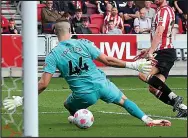  ?? ?? FINAL WORD: Ajer adds the third for Brentford