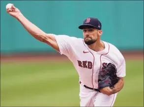  ?? Elise Amendola / Associated Press ?? Boston Red Sox starting pitcher Nathan Eovaldi delivers in the first inning against the Tampa Bay Rays on Wednesday at Fenway Park.
