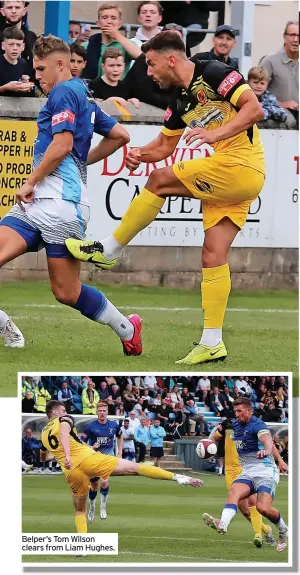  ??  ?? Belper’s Tom Wilson clears from Liam Hughes.