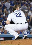  ?? WALLY SKALIJ/TRIBUNE NEWS SERVICE ?? Los Angeles Dodgers pitcher Clayton Kershaw (22) watches a solo home run by the Nationals' Juan Soto, tying the game in the eighth inning on Wednesday.