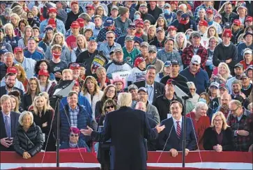  ?? PRESIDENT TRUMP Evan Vucci Associated Press ?? praises supporters for their “good genes” and mentions the “racehorse theory,” breeding to encourage certain traits, at a rally in Bemidji, Minn. “This is at the heart of Nazi ideology,” a rabbi says.