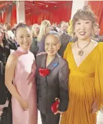  ?? – PHOTO FROM DOLLY’S TWITTER ?? Dolly with The Whale actress Hong Chau and Sandra Oh.