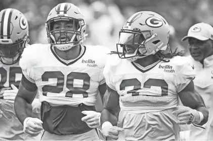  ?? SAMANTHA MADAR/USA TODAY NETWORK-WISCONSIN ?? The Green Bay Packers backfield could look very different this season after four years of AJ Dillon and Aaron Jones.