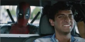  ?? TWENTIETH CENTURY FOX VIA AP ?? This image released by Twentieth Century Fox shows Ryan Reynolds and Karan Soni in a scene from “Deadpool 2.”