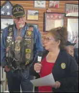  ?? PHOTO COURTESY OF COFFEE4VET­S ?? American Legion leaders Marcy Velador and Phil Waln honor recently deceased World War II veteran Phil Babijan.