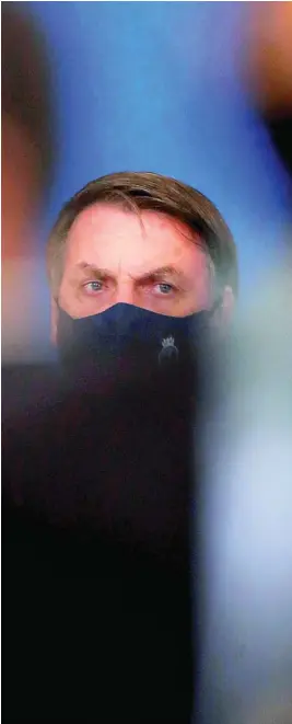  ?? REUTERS ?? El presidente de Brasil, Jair Bolsonaro, en una imagen con mascarilla, como no acostumbra