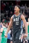  ?? PHOTO: AP ?? The Atlanta Hawks’ De’Andre Hunter reacts after making a three-pointer during their NBA game against the Boston Celtics in Atlanta, Georgia, on Monday.