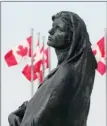  ?? The Canadian Press ?? The statue of Veritas (Truth) is shown in front of the Supreme Court of Canada in Ottawa.