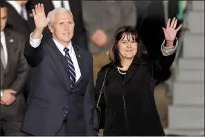  ?? AP/TSAFRIR ABAYOV ?? U.S. Vice President Mike Pence and his wife, Karen, acknowledg­e greetings after arriving at the airport in Tel Aviv, Israel, on Sunday.