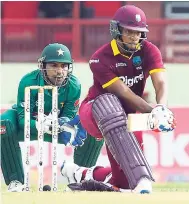  ?? PHOTO BY WICB MEDIA/RANDY BROOKS ?? Kieran Powell reverse sweeps during the first ODI match between West Indies and Pakistan at Guyana National Stadium, Providence, Guyana yesterday.