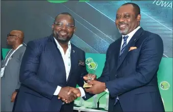  ?? ?? L-R: MD/CEO of UTM Floating Liquified Natural Gas, (FLNG) Dr. Julius Rone, and Ghanaian Minister of Energy, Dr. Matthew Opoku Prempeh at the Nigeria Internatio­nal Energy Summit 2024 in Abuja...recently