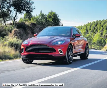  ??  ?? > Aston Martin’s first SUV, the DBX, which was revealed this week