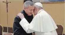  ?? THE ASSOCIATED PRESS ?? Bishop of Osornos Juan Barros, left, greets Pope Francis during a meeting at the Vatican.