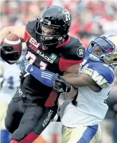  ?? JULIE OLIVER/POSTMEDIA NETWORK ?? Ottawa’s Patrick Lavoie runs into Winnipeg’s Moe Leggett on a carry during first-half action in the Ottawa Redblacks matchup with the Winnipeg Blue Bombers at TD Place in Ottawa on Aug. 4. Lavoie’s Redblacks can put themselves in playoff contention in...