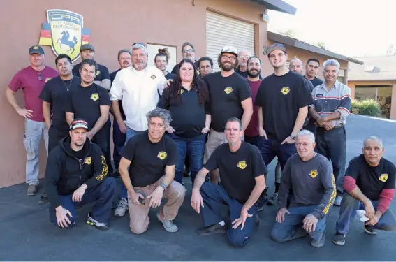  ??  ?? Above: California Porsche Restoratio­n has around 35 people on its payroll! At the centre of the group photo is Andrea Doherty, owner of the company and daughter of its founder, Brian