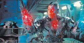  ??  ?? Ray Fisher as Cyborg in “Justice League.” Warner Bros.