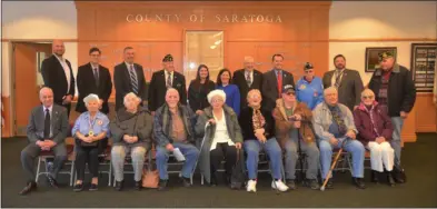  ?? LAUREN HALLIGAN - MEDIANEWS GROUP ?? Family members of Charles Drew Sr. and elected officials gather during an Honoring Our Deceased Veterans ceremony on Tuesday at the Saratoga County Offices in Ballston Spa.