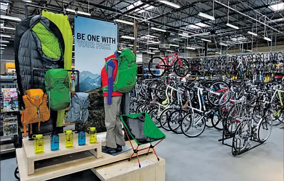  ?? DISPATCH PHOTOS ?? ADAM CAIRNS Central Ohio’s first REI store has a large bicycling department, as well as areas for camping, hiking and paddle sports.