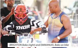  ?? ?? BRIGHTON Bako (right) and EMMANUEL Bako on bike