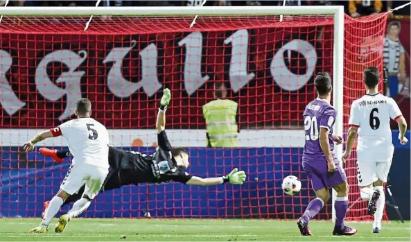  ?? — EPA ?? Bang on target: Marco Asensio (second from right) scoring Real Madrid’s second goal against Cultural Leonesa in the King’s Cup match in Leon on Wednesday.