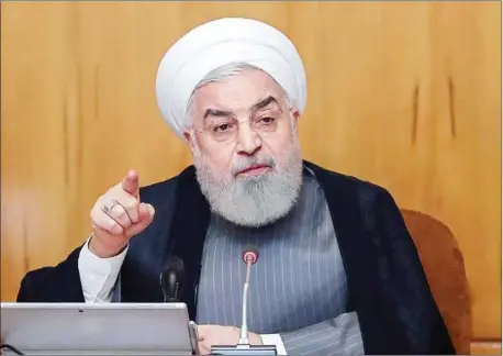  ?? IRANIAN PRESIDENCY/AFP ?? Iranian President Hassan Rouhani chairs a cabinet meeting in Tehran. Rouhani said Iran will exceed the uranium enrichment limit it agreed to in the landmark 2015 nuclear accord.