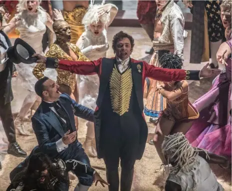  ?? NIKO TAVERNISE/TWENTIETH CENTURY/TRIBUNE NEWS SERVICE ?? Hugh Jackman’s seasoned screen presence isn’t enough to salvage The Greatest Showman as it fails to capture much of the magic of P.T. Barnum’s life.