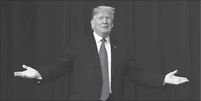  ?? AP PHOTO ?? President Donald Trump gestures to the audience as he arrives to speak at an event called Face-to-Face with our Future, Wednesday in the South Court Auditorium on the White House complex in Washington.