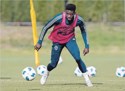  ?? DARRYL DYCK THE CANADIAN PRESS ?? Alphonso Davies played a full year of profession­al soccer this season with Vancouver Whitecaps at just 17. He now moves to Germany.