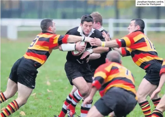  ??  ?? Jonathan Hawker, centre, in action for Pontypool