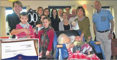  ??  ?? Aileen Horton celebrates her hundredth birthday with family at the Brabourne Care Centre. She also received a card from the Queen and a letter from Damian Green MP