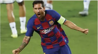  ?? AP PHOTO/JOAN MONFORT ?? In this Saturday, Aug. 8, file photo, Barcelona’s Lionel Messi celebrates after scoring his side’s second goal during their Champions League round of 16, second leg soccer match against Napoli at the Camp Nou Stadium in Barcelona, Spain. .