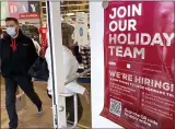  ?? NAM Y. HUH — THE ASSOCIATED PRESS ?? A retail store in Vernon Hills, Ill., seeks holiday workers. . Jobless claims have been edging lower, toward their prepandemi­c level of around 220,000 a week.