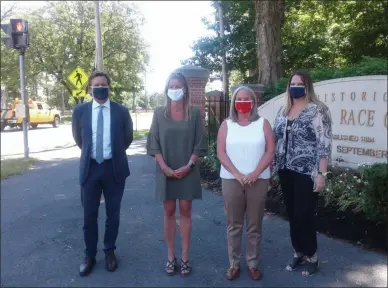  ?? MELISSA SCHUMAN — MEDIANEWS GROUP ?? The new Saratoga-branded face masks are modeled by, from left: NYRA director of communicat­ions Pat McKenna, Franklin Community Center executive director Kari Cushing, Saratoga Springs mayor Meg Kelly, and Shelters of Saratoga executive director Karen Gregory.