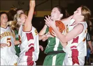  ?? Arnold Gold / Hearst Connecticu­t Media file photo ?? Guilford’s Jaci Daigneault, center, in action against Sheehan in 2006.