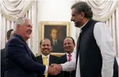  ?? — AFP ?? US secretary of state Rex Tillerson with Pakistani PM Shahid Khan Abbasi at the latter’s residence in Islamabad on Tuesday.