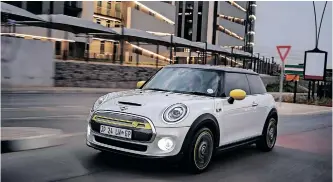  ?? ?? THE Mini Cooper SE is a helluva lot of fun zipping around tight bends but, inevitably, you have to settle down as you think about getting to your destinatio­n with the remaining charge