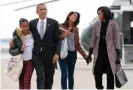  ??  ?? ‘His solace’: the Obamas board Air Force One in Chicago, November 2012. Photograph: Jewel Samad/AFP/Getty Images