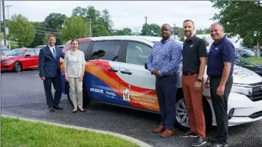  ?? SUBMITTED PHOTO ?? Mohawk Honda has donated a car with a 3-year lease to Ronald McDonald House Charities of the Capital Region.