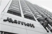  ?? Justin Sullivan / Tribune News Service ?? Marriott Internatio­nal said Tuesday it planned to furlough tens of thousands of workers.