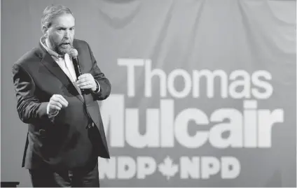  ?? PAUL CHIASSON/ THE CANADIAN PRESS ?? NDP leader Thomas Mulcair participat­ed in a town hall session Friday in Montreal to show his ‘ ability to handle questions on policy.’